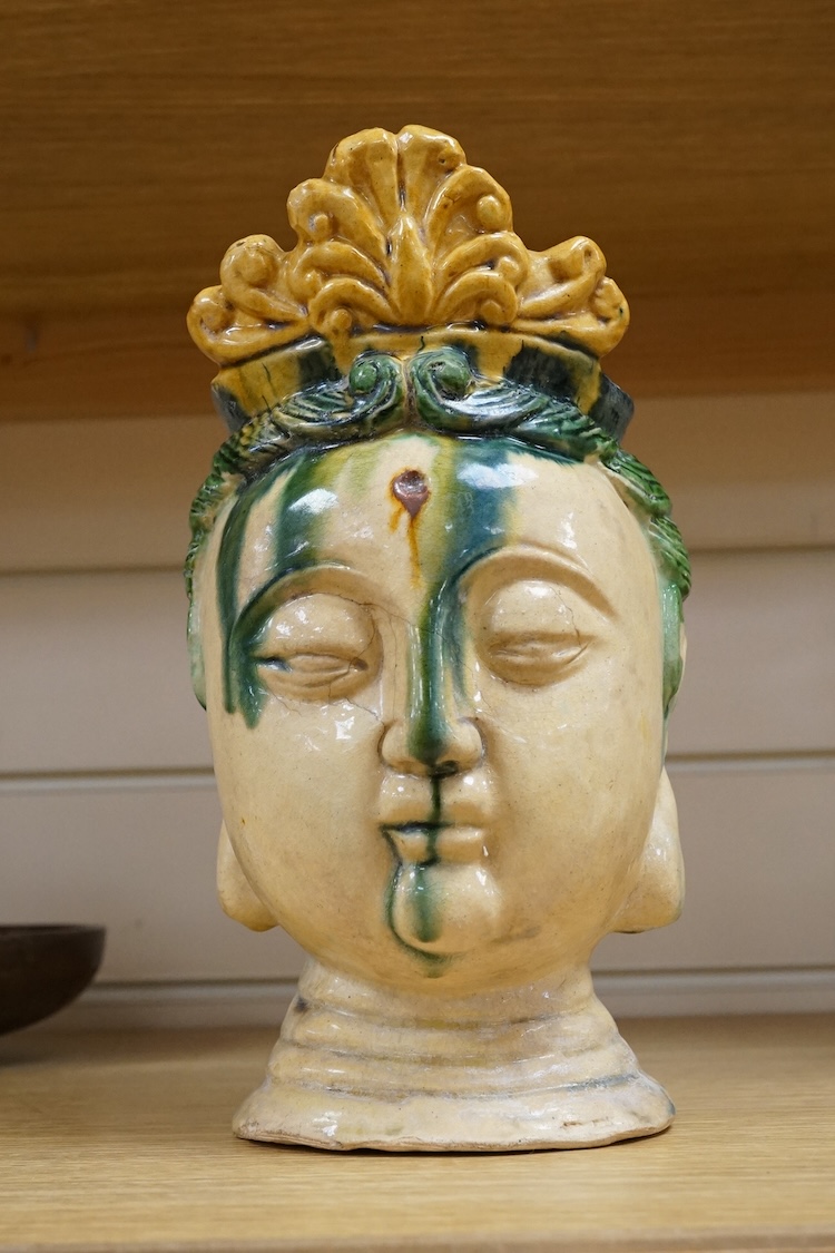 A Chinese Sancai glazed bust of a Bodhisattva, 23cm high